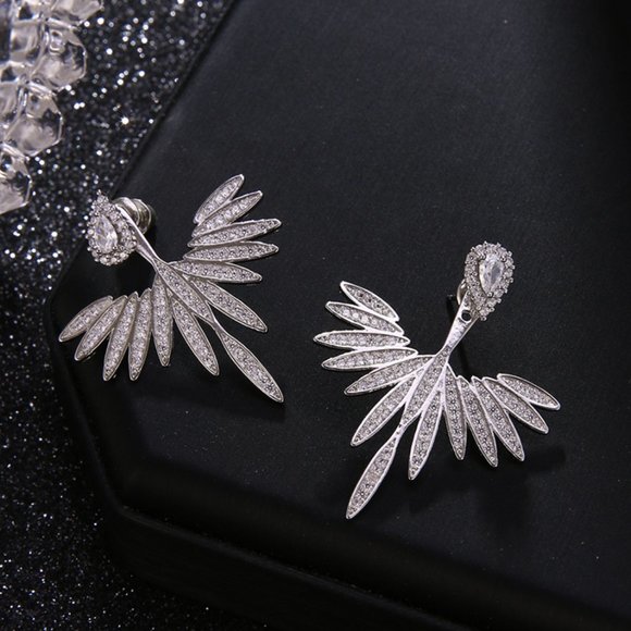 Sparkling winged silver earrings